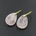 Geometric water drop earrings with crystal stones in various colours on an electroplated metal setting.
