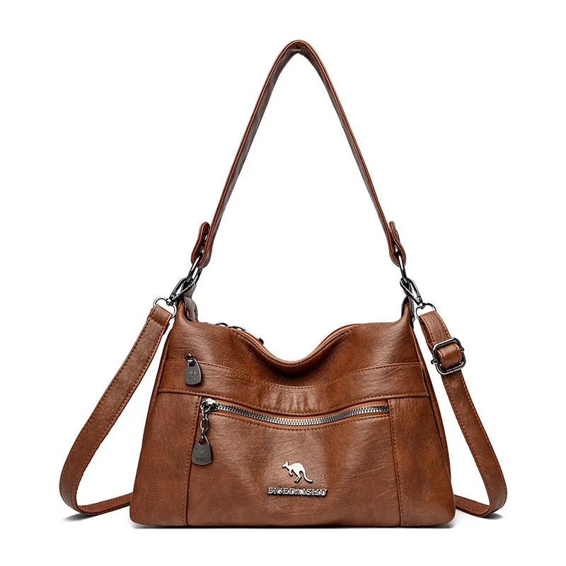 Genuine leather double-sided kangaroo crossbody bag in black with belt decoration and soft sheepskin finish.