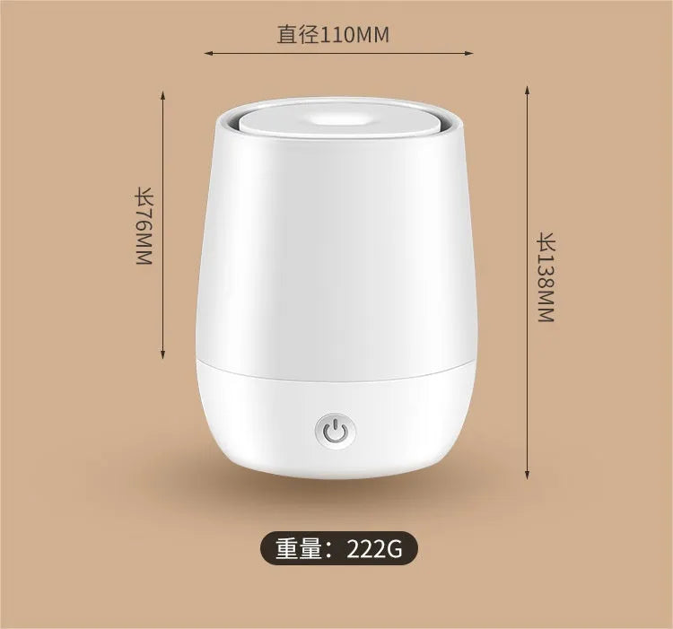 White USB aromatherapy humidifier with simulated flame effect showing 125ml water tank capacity
