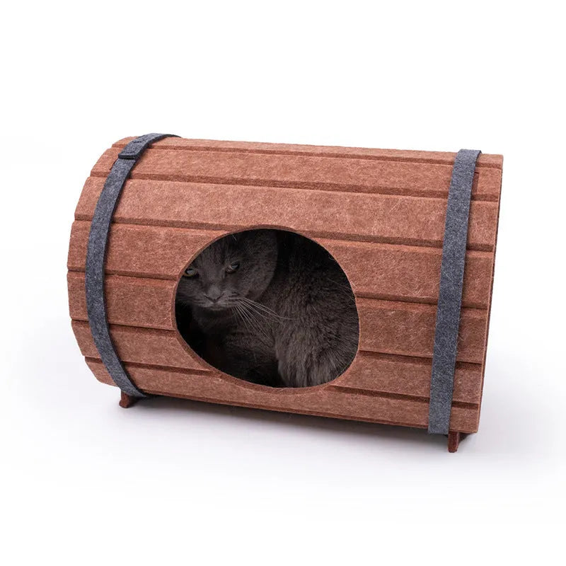 Assembled wine barrel pet bed made from three grey felt panels, forming a circular cat nest.