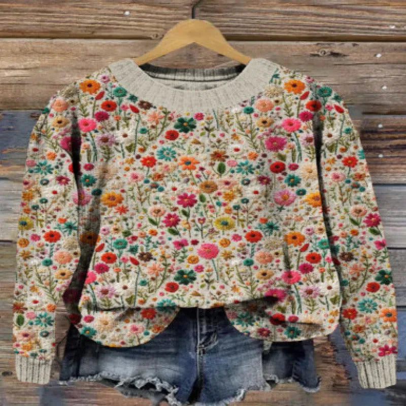 Digital printed floral pattern on a grey round neck sweater, showing the front view.