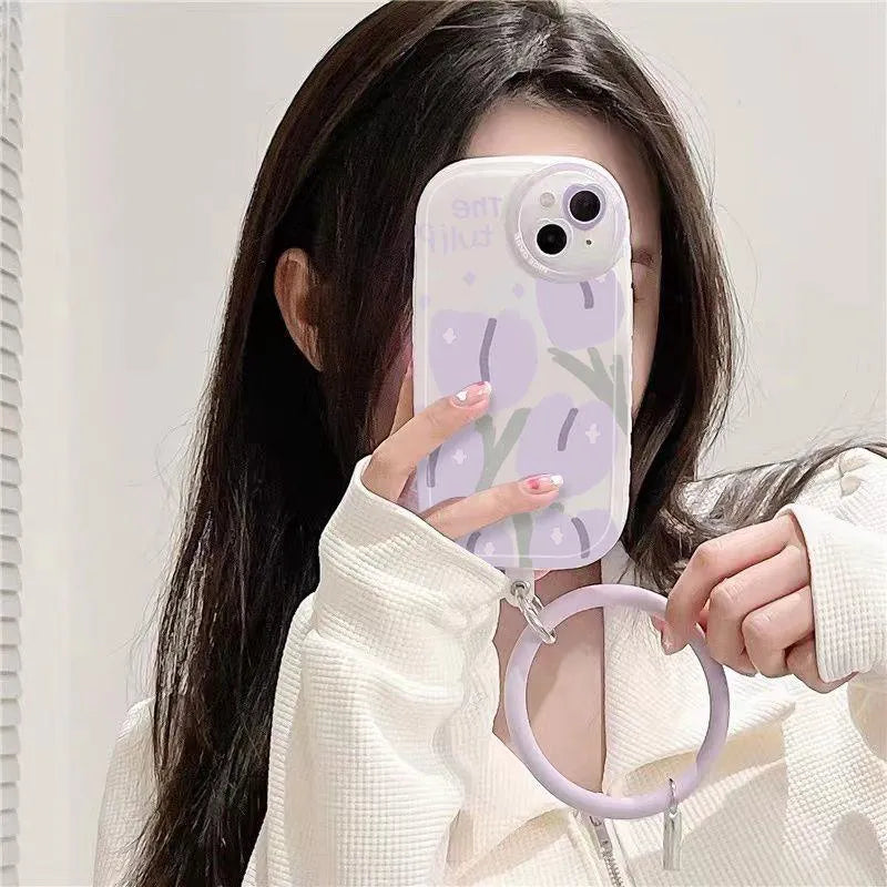 Clear Purple Tulip phone case with heart lens detail and matching violet purple bracelet for iPhone.