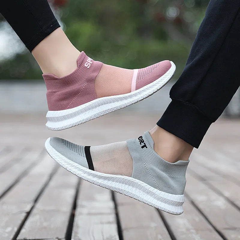 Low-top Flyknit casual sock shoes in khaki colour with lace closure and MD sole.