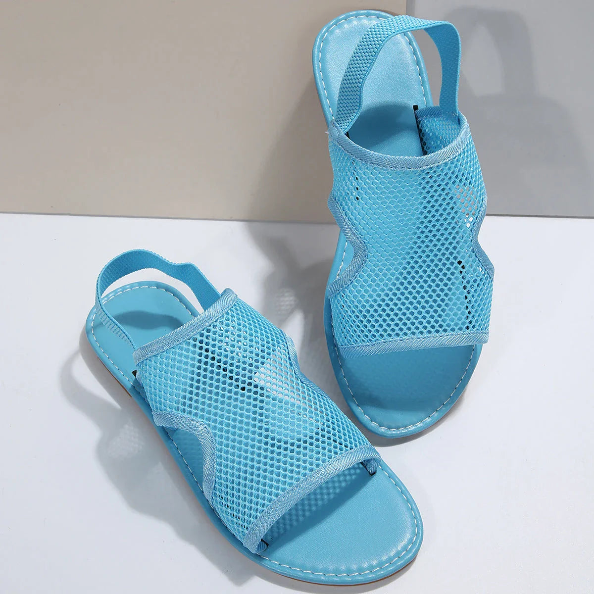 Stylish and breathable mesh sandals in various vibrant colors for men and women