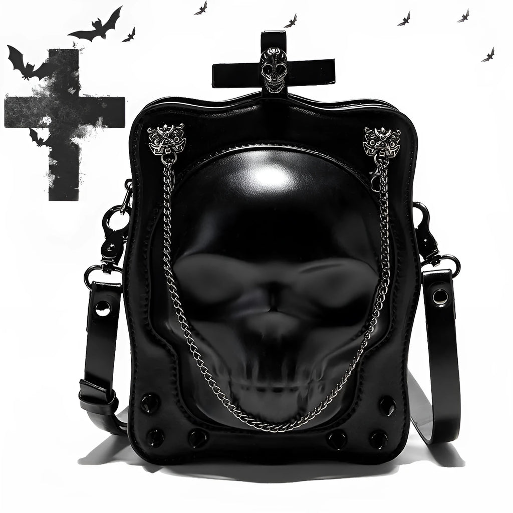 Black mini square crossbody bag with embossed skull design and metal chain strap