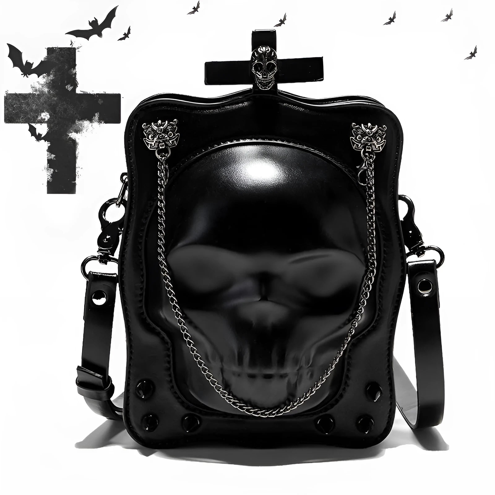 Black mini square crossbody bag with embossed skull design and metal chain strap