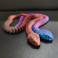 3D printed snake toy decoration in realistic animal simulation style, available in multiple colours and sizes including 30cm, 45cm, 60cm
