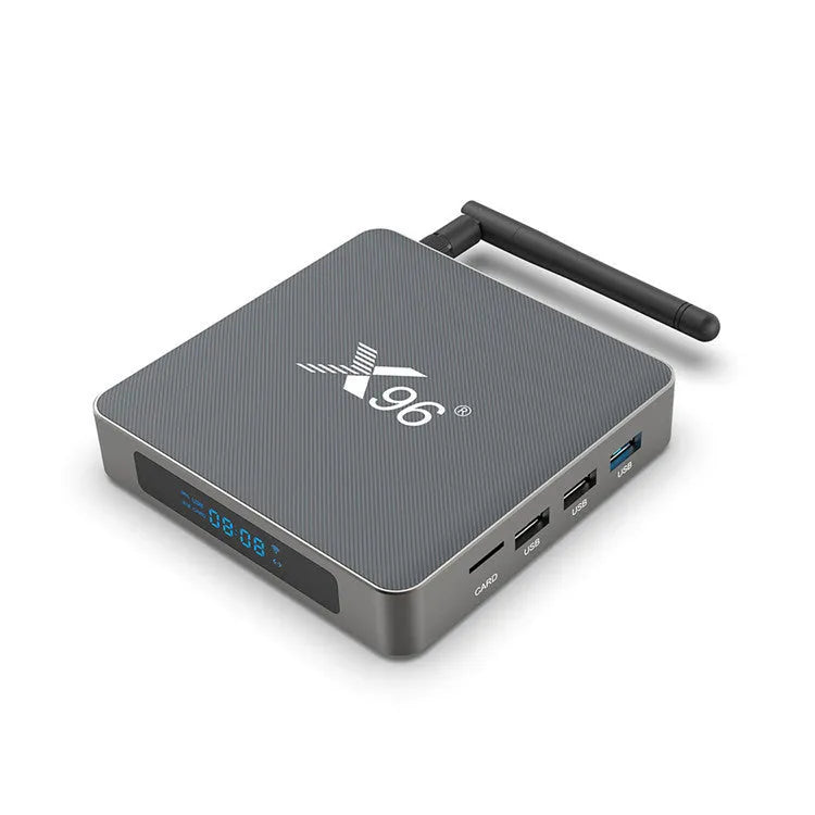 Android smart set-top box with remote control, HDMI cable, and power adapter on a table