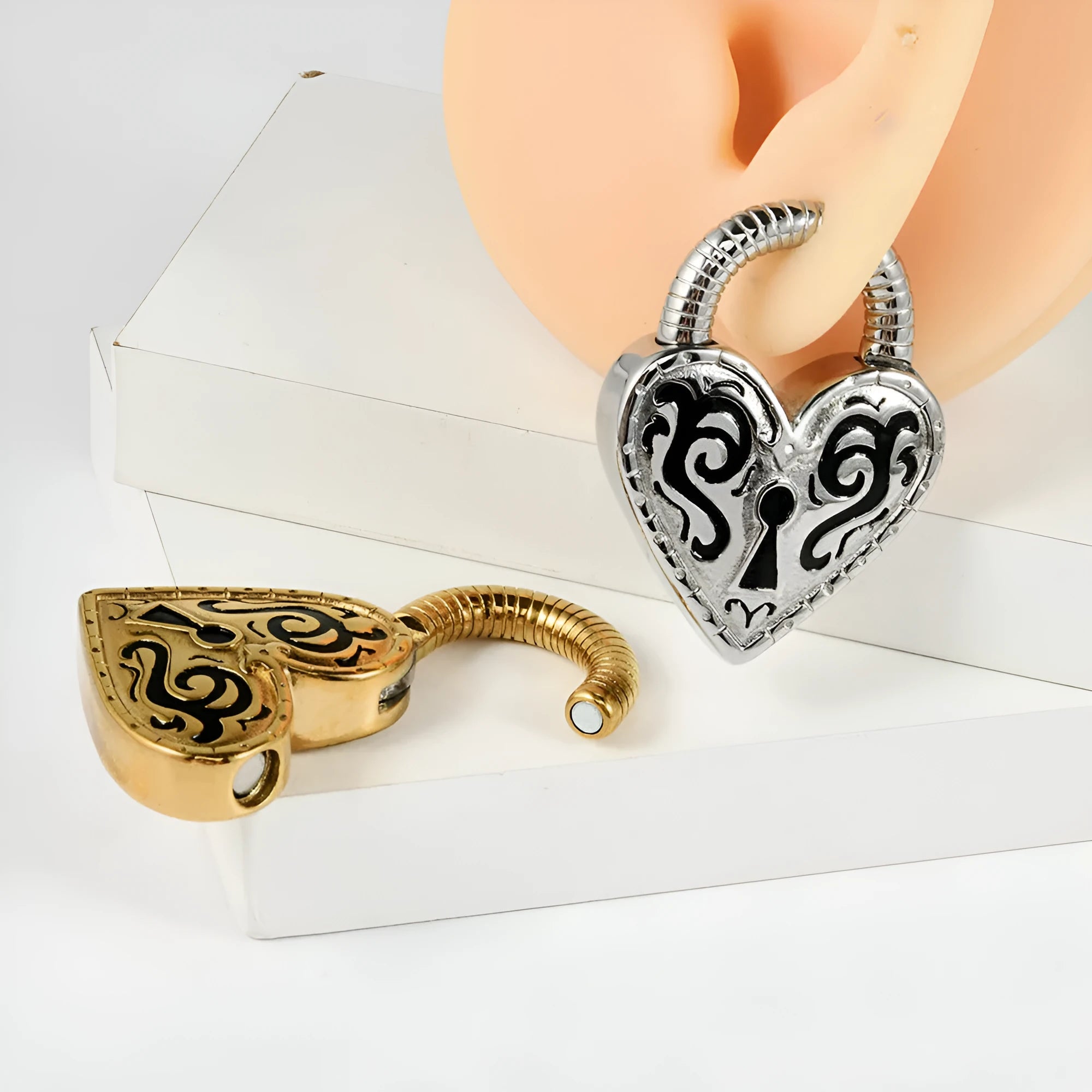 Heart-shaped stainless steel earrings with gold or steel colour electroplated finish