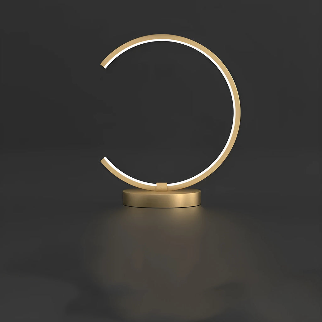 All copper Nordic style table lamp with tri-tone LED light, push button switch, on a wooden desk