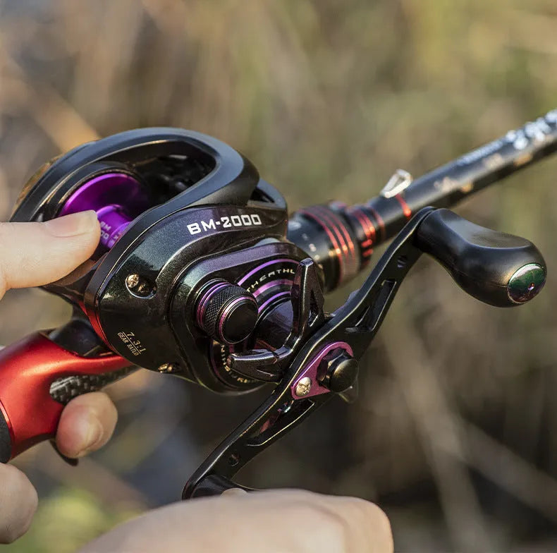 Colourful BM2000 fishing reel showing left-handed model with magnetic brake and water drop spool.