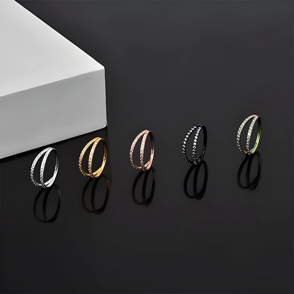 G23 titanium alloy nose ring in gold colour on a white background, showing a circular shape.
