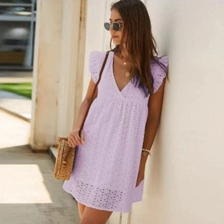 Chic Breezy Cotton Mini Dress with V-Neck, a versatile and comfortable summer fashion item