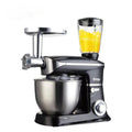 Black three-in-one household kitchen machine with juicer, dough mixer, and meat mincer functions on countertop