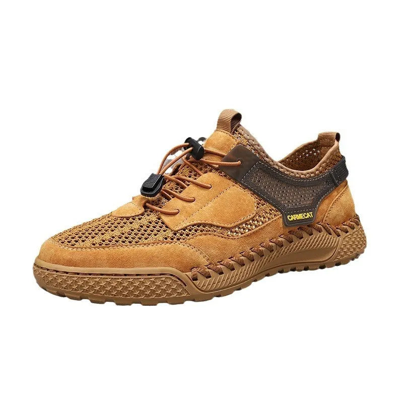 Men's brown suede tennis shoes with elastic closure and hand-stitched rubber soles