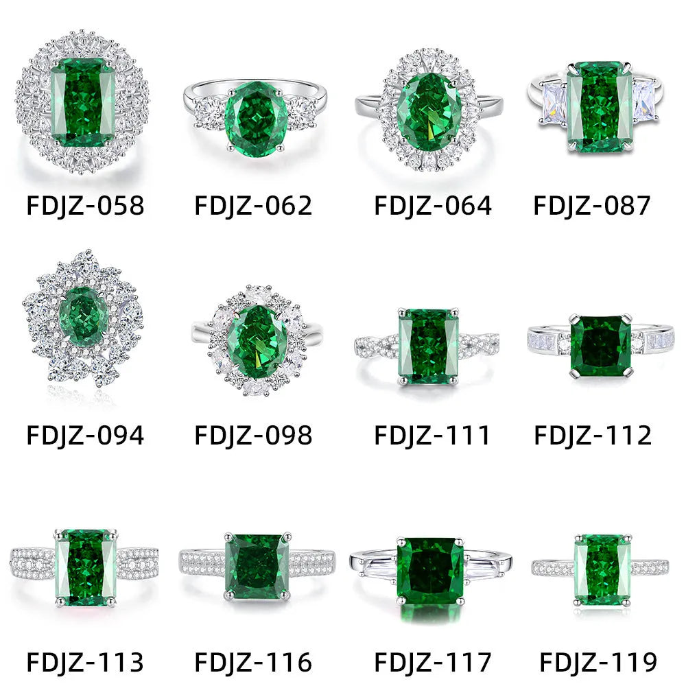 S925 silver ring with an inlaid green emerald stone and sparkling diamond detailing on a geometric band.