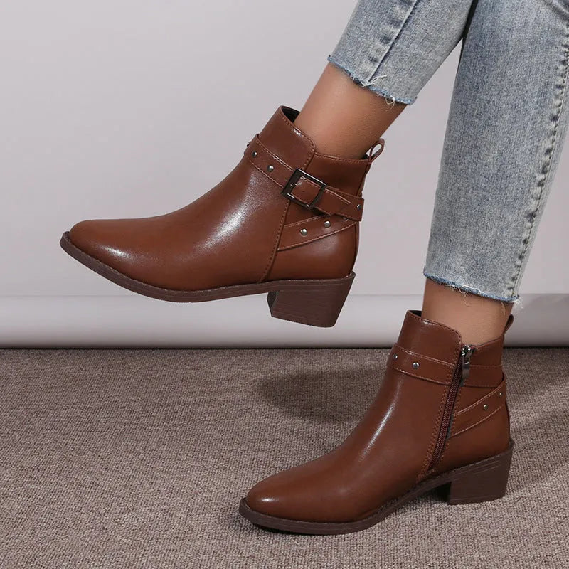 Retro chunky heel studded buckle pointed toe Martin boots in faux leather, black colour, block heel, rubber sole.