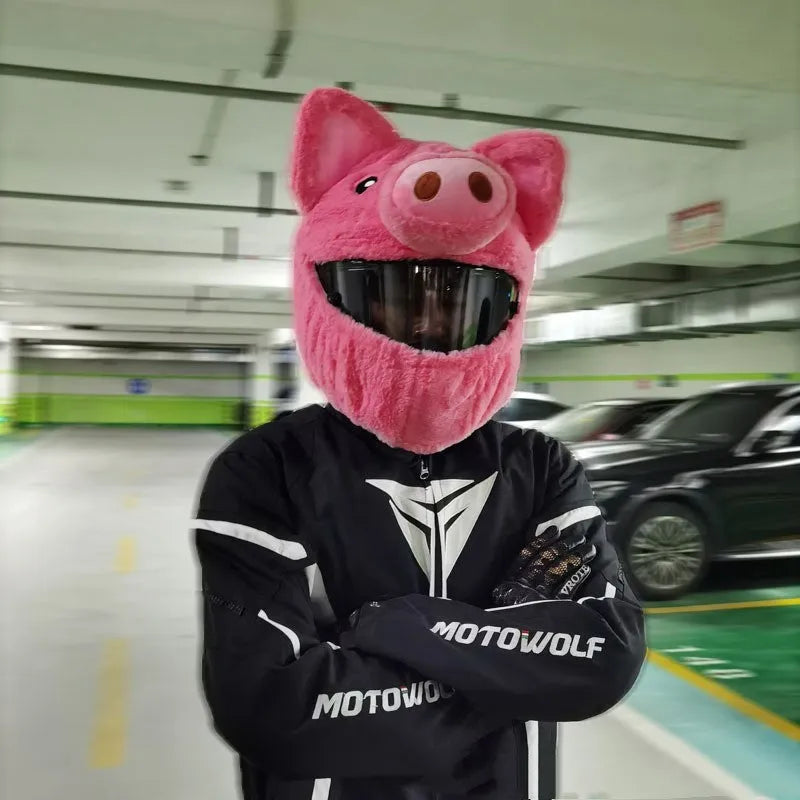 Pink pig cartoon design plush hood for wearing under a motorcycle helmet.
