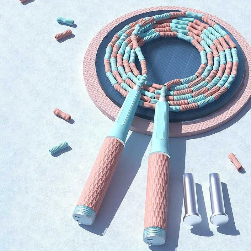 Children's skipping rope with coloured bamboo beads on a 2.8m polypropylene cord.