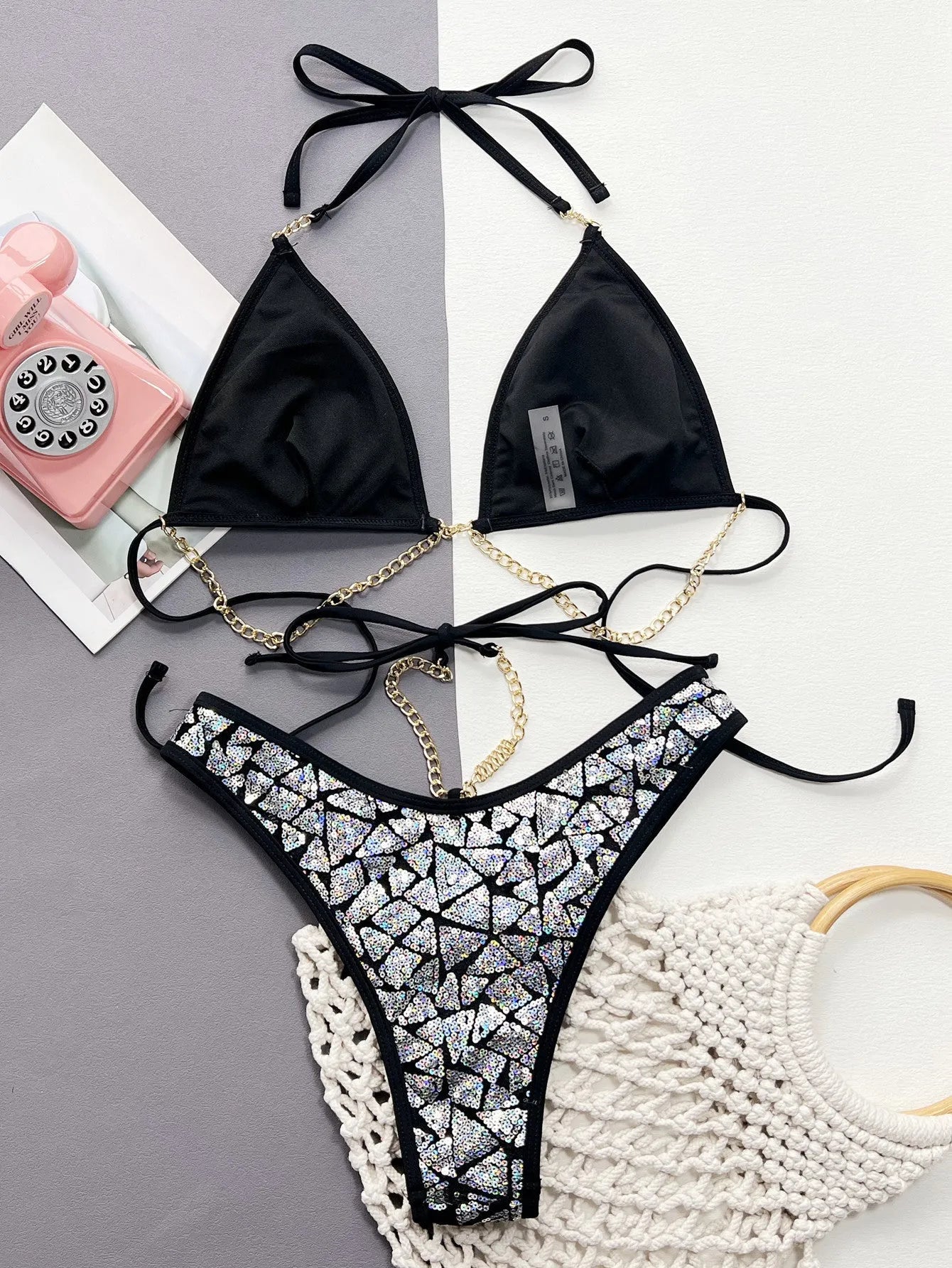 Women's silver black bikini swimwear with chain detailing for swimming
