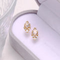 Geometric silver earrings with natural white crystal studs
