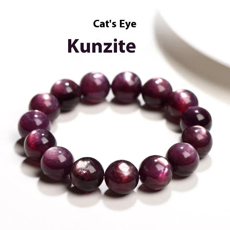 Natural purple lepidolite crystal round bead bracelet on a white background.