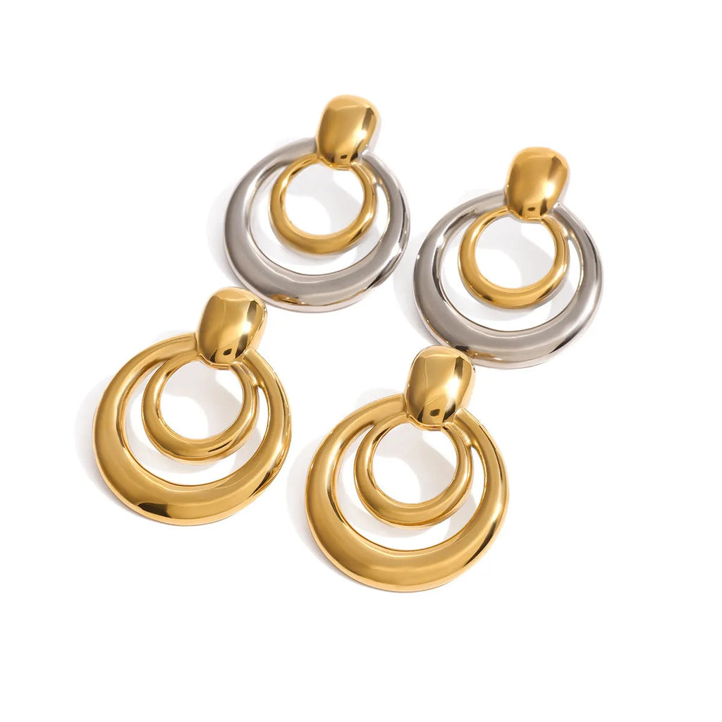 Round double layer hollow geometric stud earrings in gold tone with butterfly backs