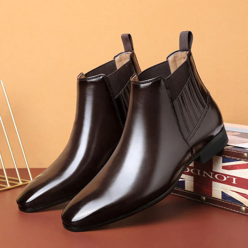 Stylish pointed-toe Chelsea boots for men in black and brown colors, featuring a square heel and sleek, British-inspired design.