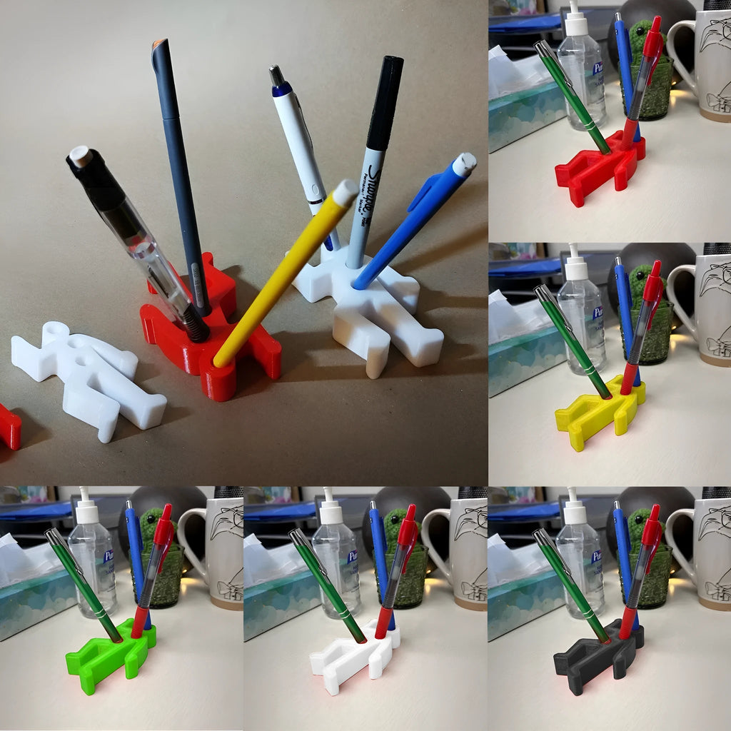 Funny crime scene humanoid pen holder in plastic with triangle shape on a desk