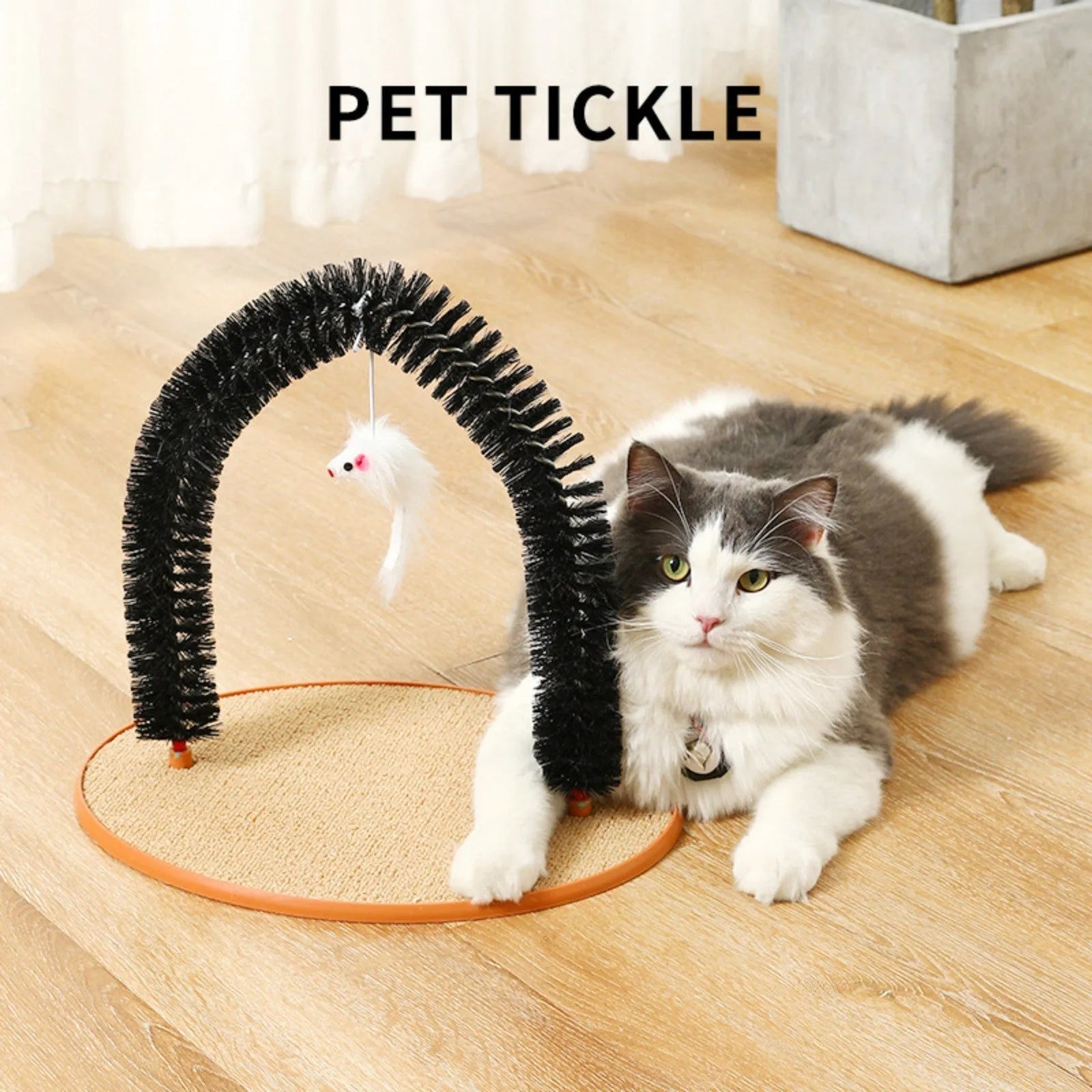 Black arch-shaped cat scratching post with grooming brush and attached mouse toy on non-slip base