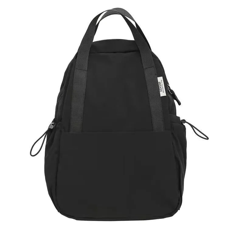Solid colour nylon backpack in multiple colours with curved shoulder straps, shown in small and large sizes.