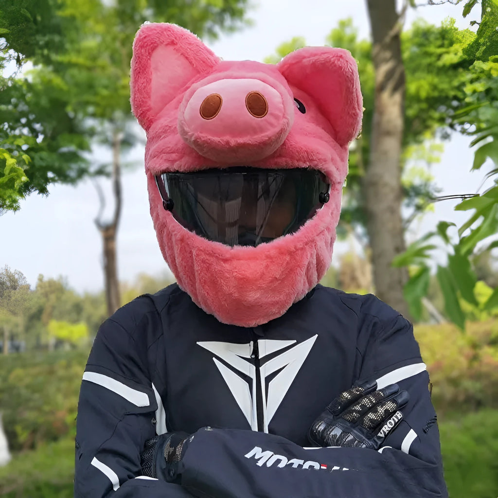 Pink pig cartoon design plush hood for wearing under a motorcycle helmet.