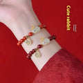 Purple Gold Sand cinnabar bracelet with hare motif in 6mm or 8mm bead sizes