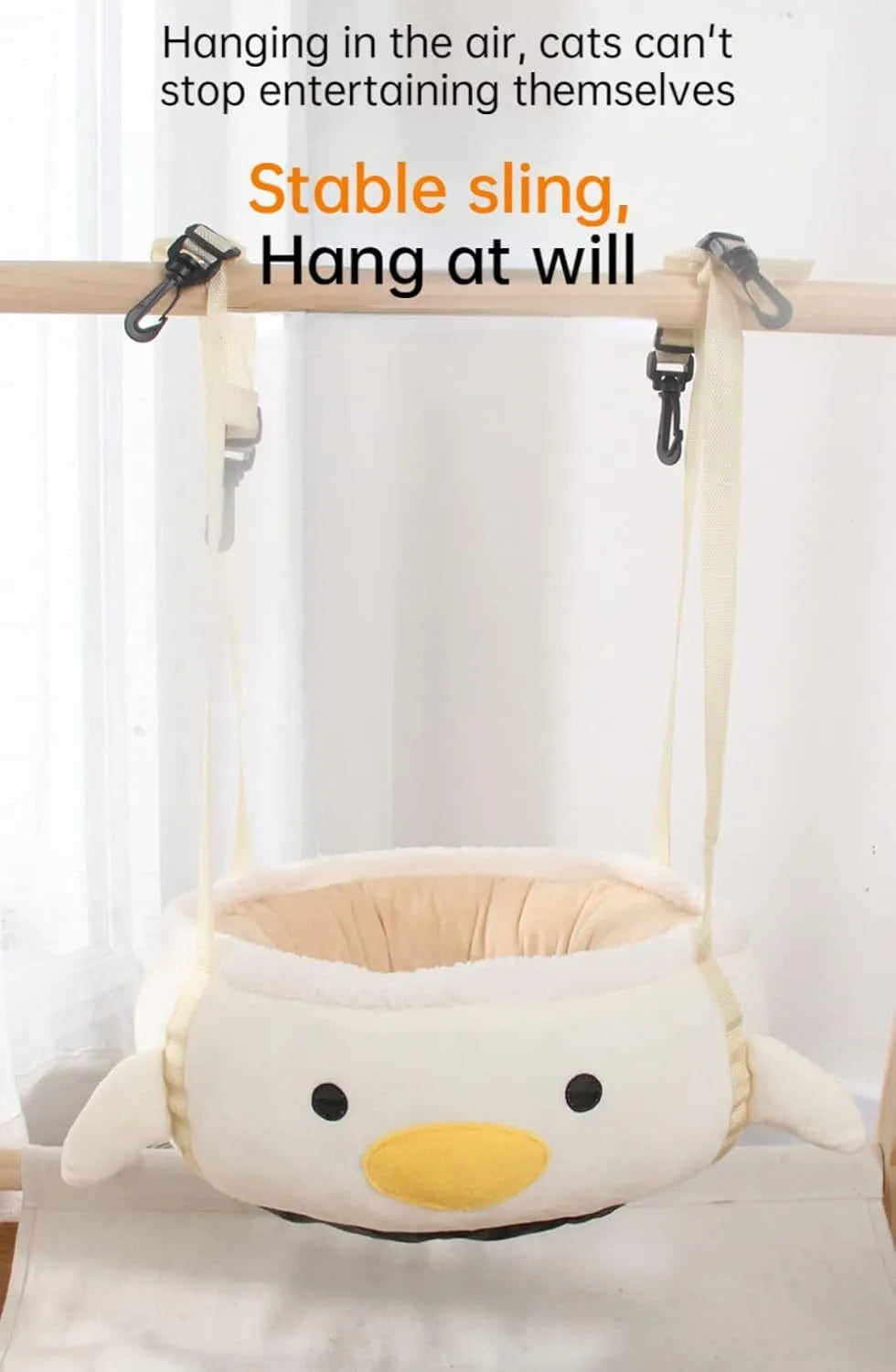 Green chick and dinosaur shaped plush cat bed shown both lying flat and hanging as a hammock.