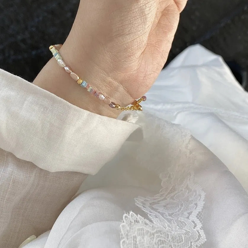 Purple natural pearl bracelet and necklace set with 14K gold gilding and irregular pearl shapes