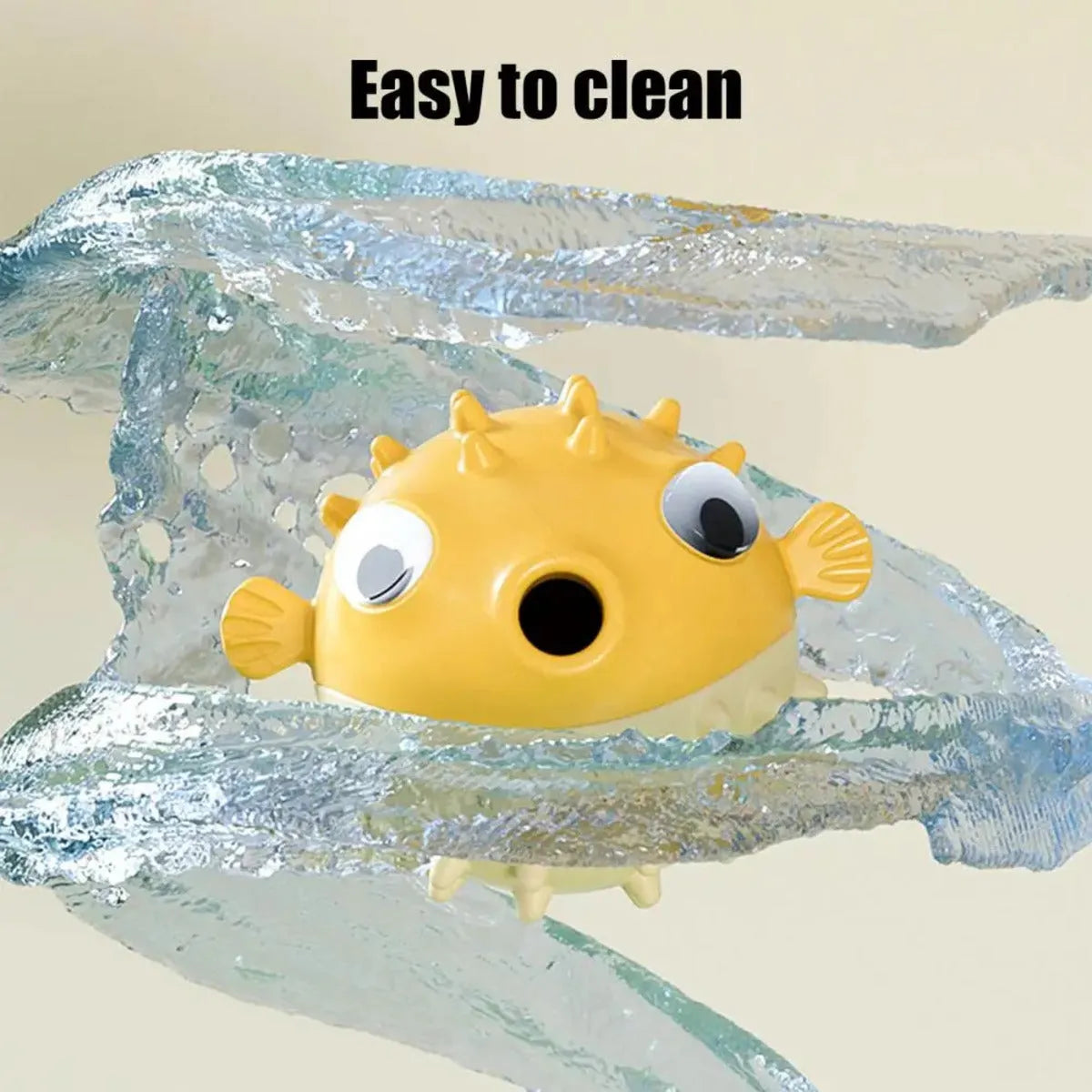 Yellow durable vinyl fish-shaped dog chew toy with squeaker for aggressive chewers.