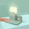 Dark green 3-in-1 Qi wireless charger stand showing phone on angled pad and earbuds in dock.