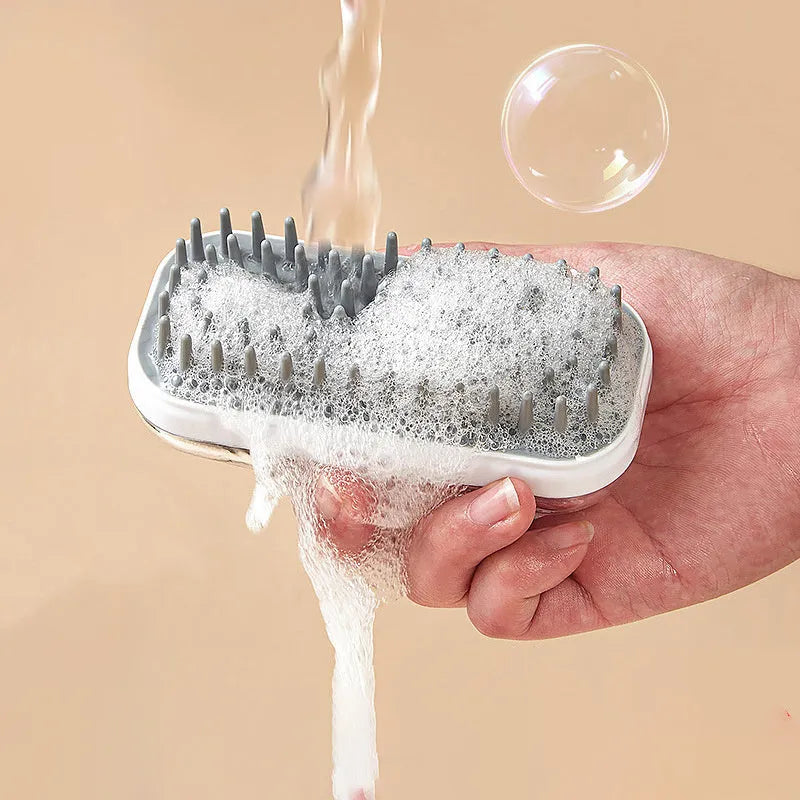 Silicone pet bath massage brush for dogs and cats with hand strap and suction cup attachment