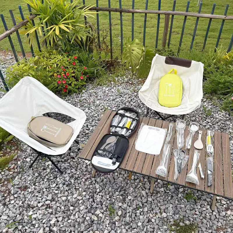 Portable picnic kitchenware storage bag containing 12 stainless steel utensils.