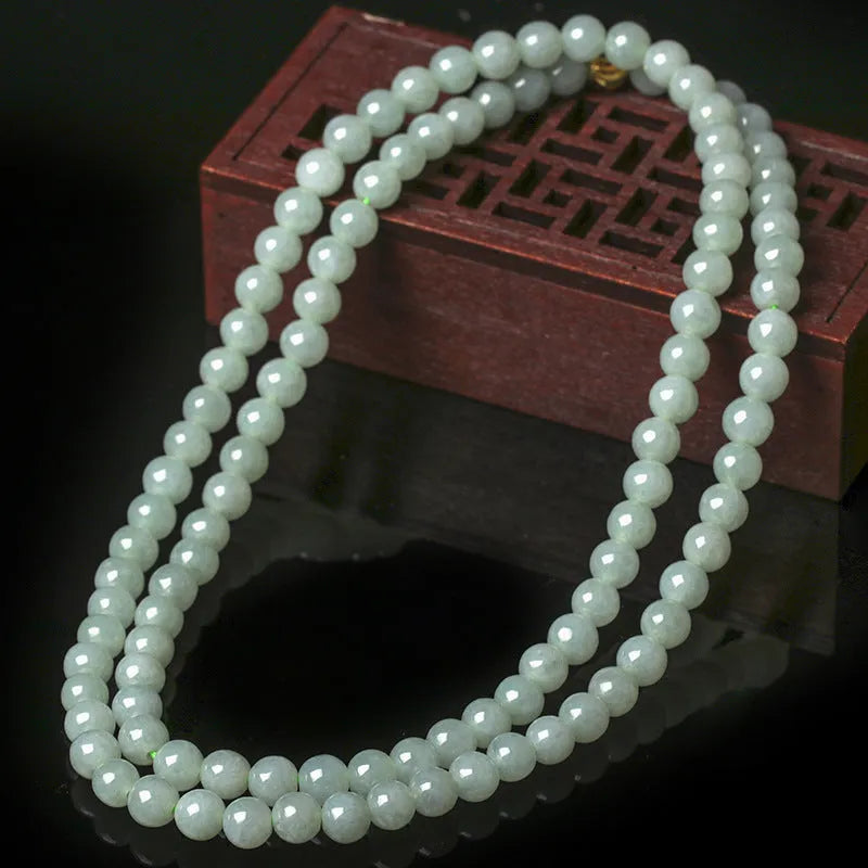 Adjustable jade bead necklace with 6.5mm round beads showing white and green colour variations