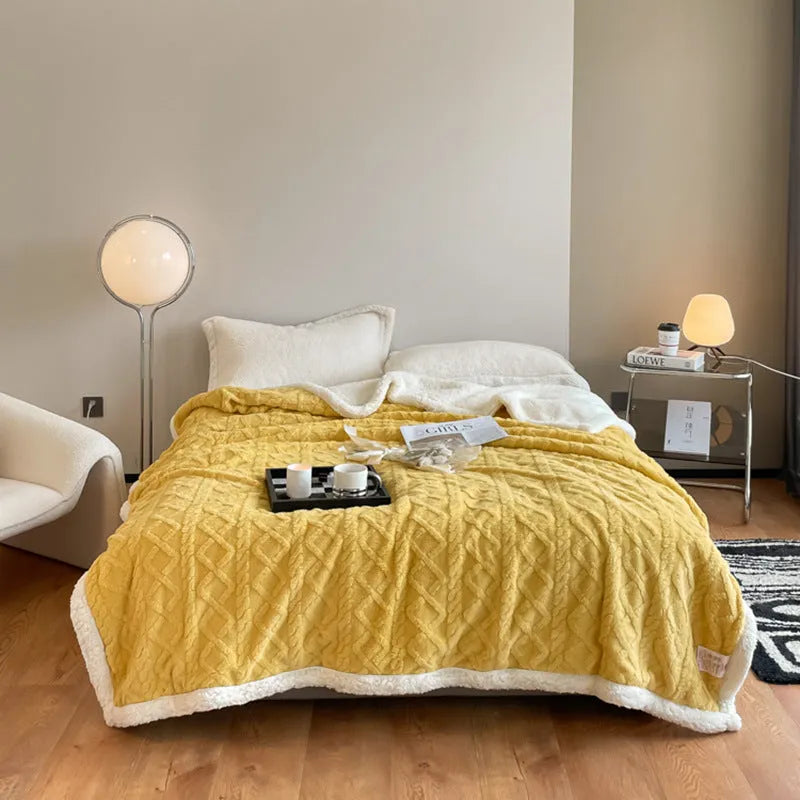 A thick taffeta thermal flannel blanket for winter, shown in one of nine colours on a bed.