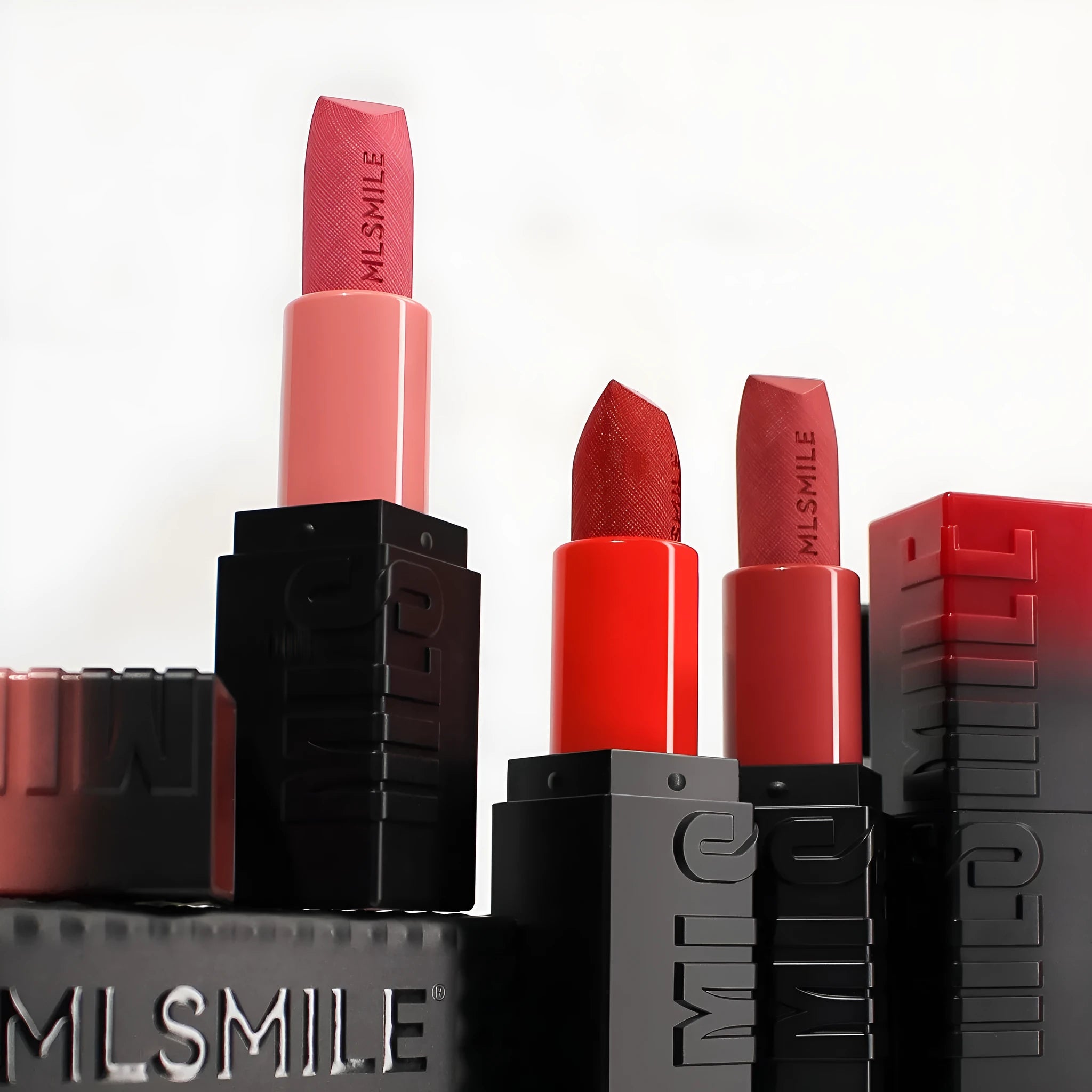MLSMILE embossed lipstick set of three tubes in a decorative presentation box.