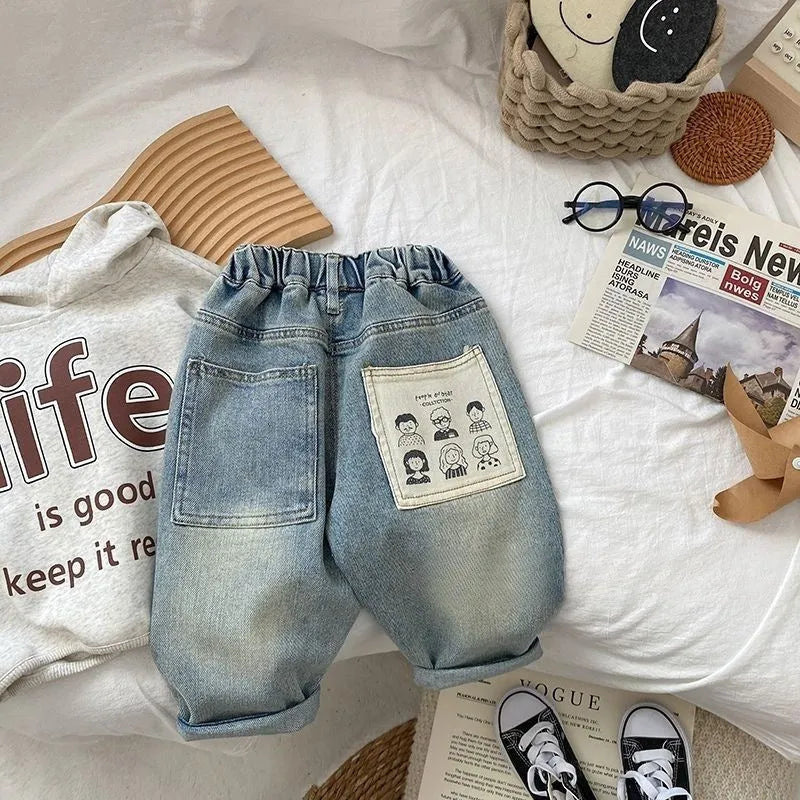 Light coloured boys casual denim jeans with elastic waist and personalised back pocket print