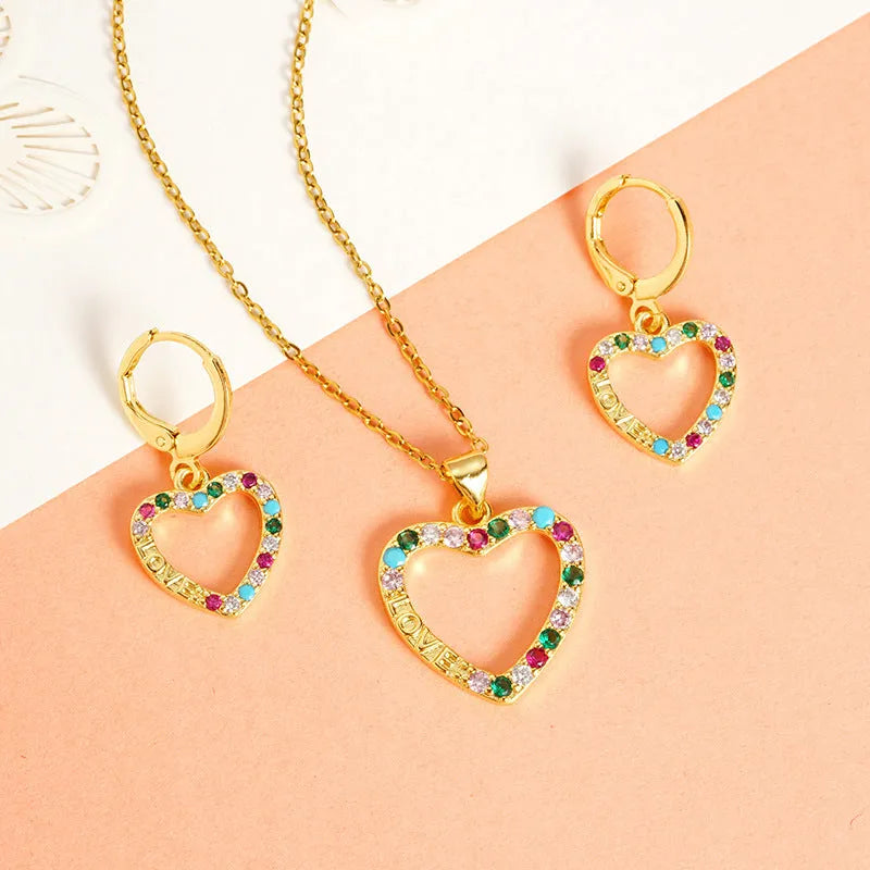Heart-shaped copper alloy necklace and ear studs set with electroplated finish, O-ring chain, and butterfly design