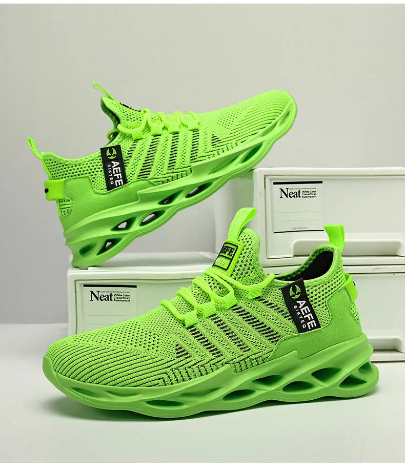 Men's black mesh casual running shoes with cross straps, low-top design, and rounded toe.