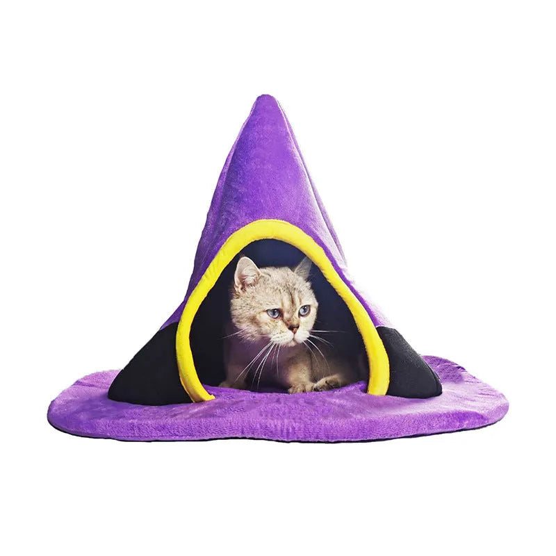 Purple cloth witch hat shaped cat bed for Halloween.