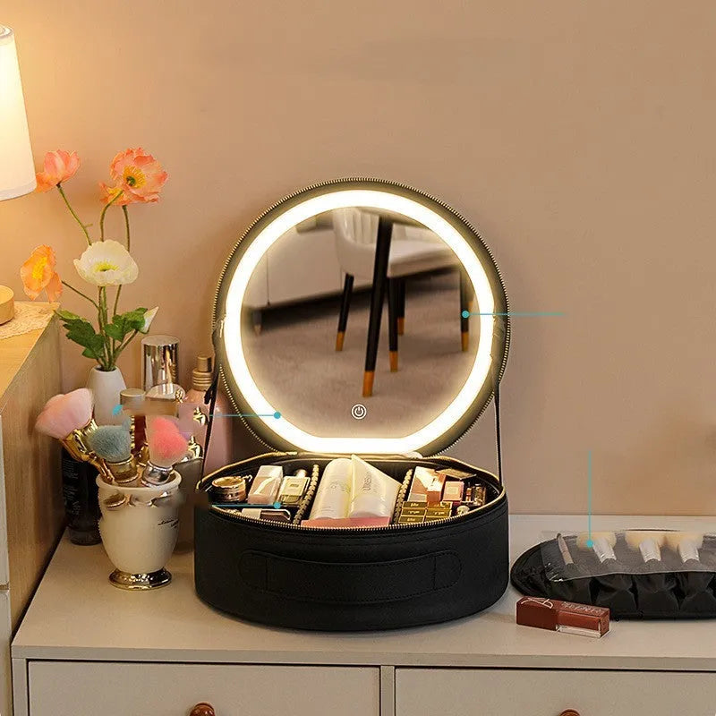 Round pink PU leather LED makeup bag open showing internal mirror, lights, and lattice partitions.
