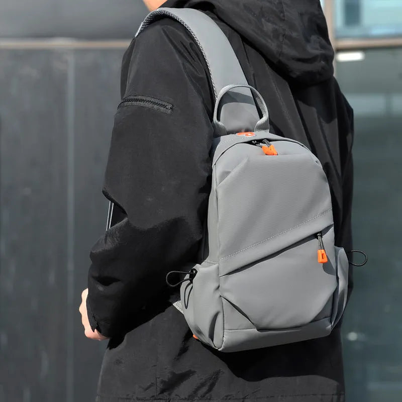 Black mens waterproof polyester crossbody bag with adjustable shoulder strap