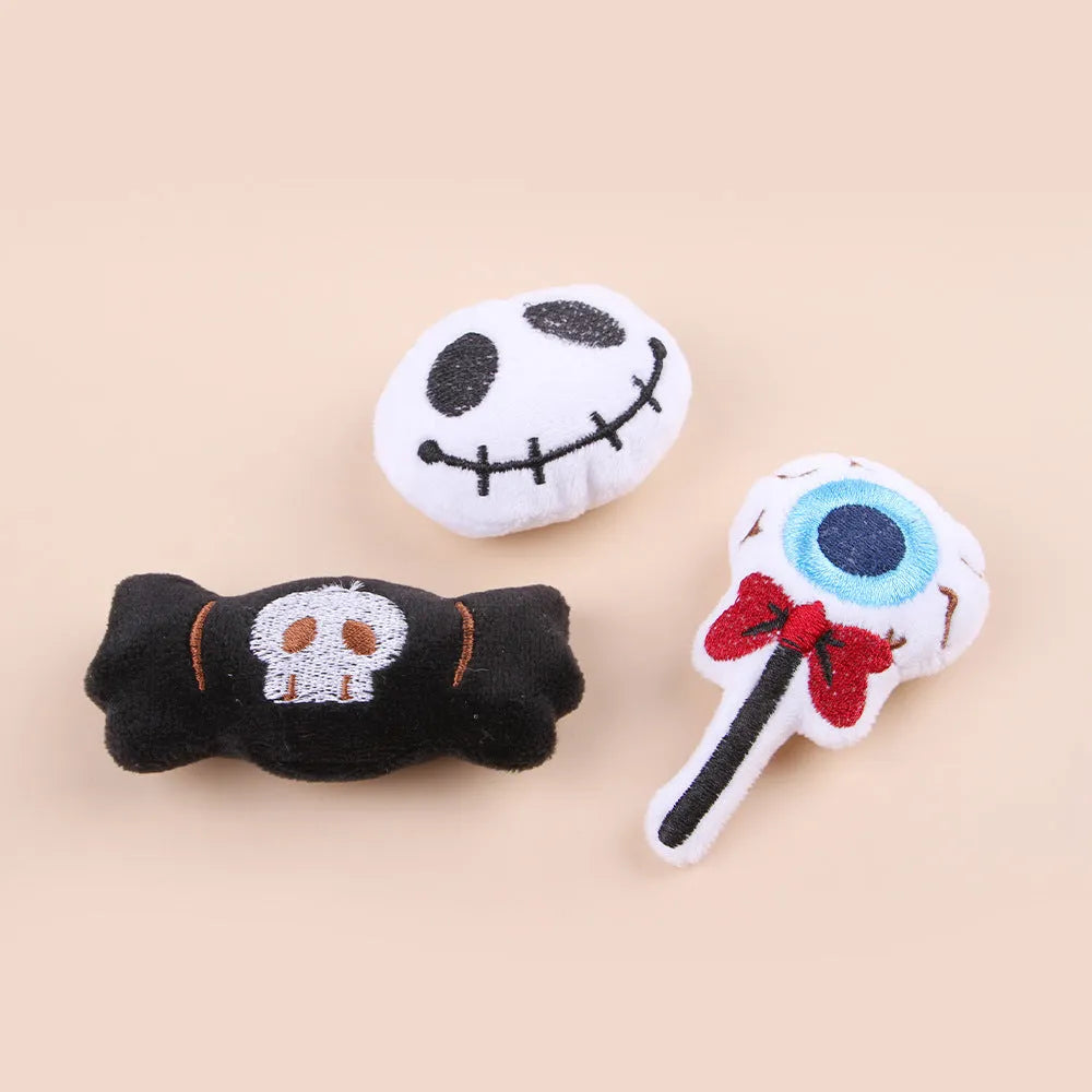 Plush cat teaser wand with candy-shaped attachment for interactive play