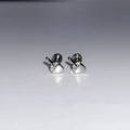 Women's alloy cartilage earring with screw clasp and vertical middle finger colour design